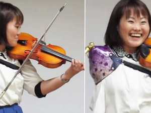 الفنانة اليابانية مانامي إيتو تدخل موسوعة غينيس كأول عازفة كمان باستخدام ذراع اصطناعية الفنانة اليابانية مانامي إيتو تدخل موسوعة غينيس كأول عازفة كمان باستخدام ذراع اصطناعية