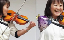 الفنانة اليابانية مانامي إيتو تدخل موسوعة غينيس كأول عازفة كمان باستخدام ذراع اصطناعية