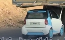 الطوموبيل لقات الظل وركنات تحت الشاحنة